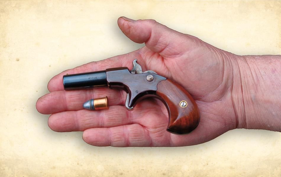 Shown here with a Navy Arms .41 Short Rimfire copper-cased cartridge, this ...