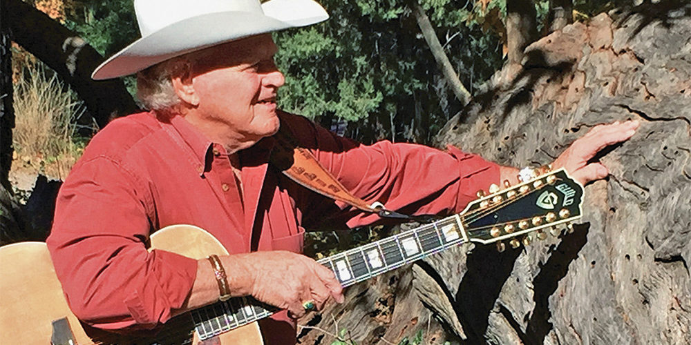 dolan ellis singer songwriter what history has taught me guitar hat cowboy true west magazine