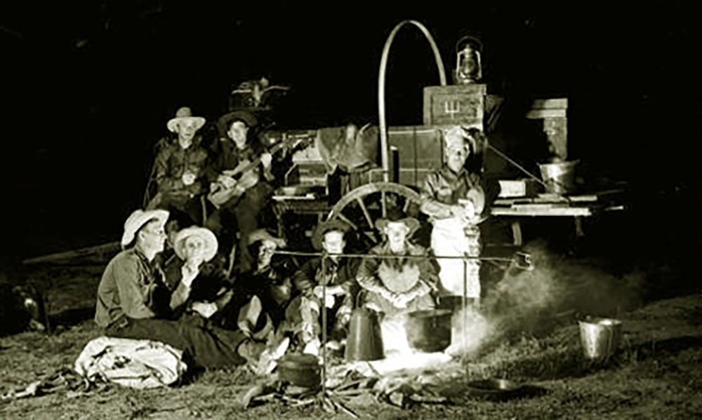 cowboys around a chuckwagon true west magazine